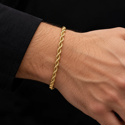 Pulso de oro tejido torsal de 4 mm puesto en la muñeca, DP&C Joyas