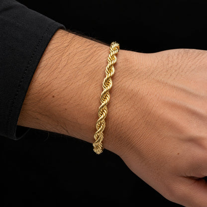 Pulso de oro tejido torsal de 5 mm puesto en la muñeca, DP&C Joyas