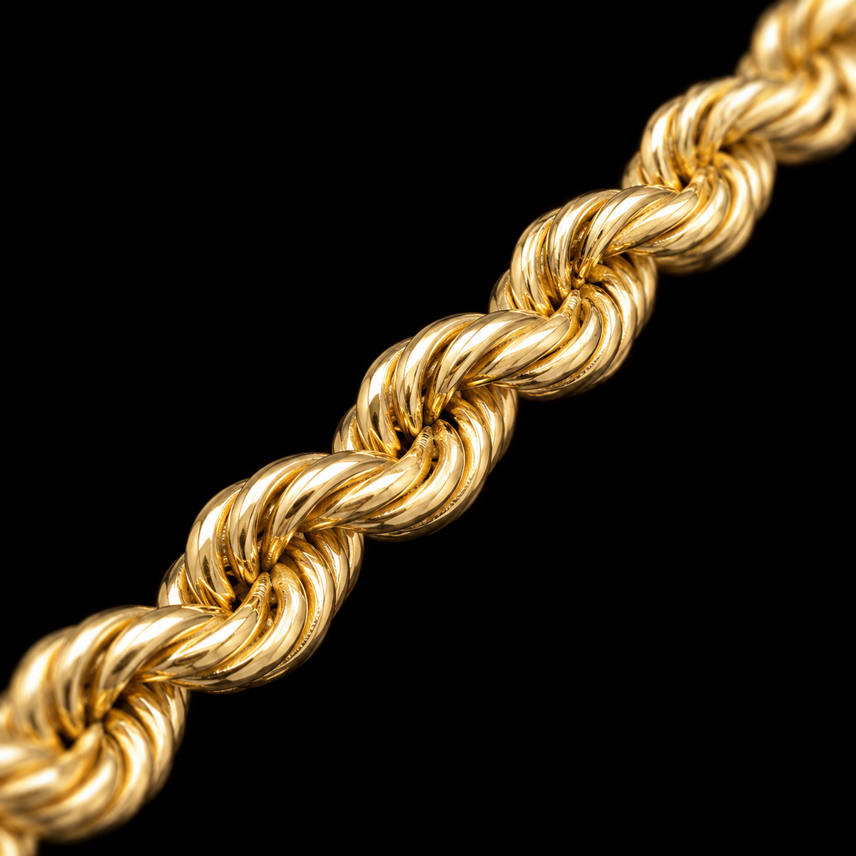 Detalle macro del tejido torsal del pulso de oro de 5 mm, DP&C Joyas