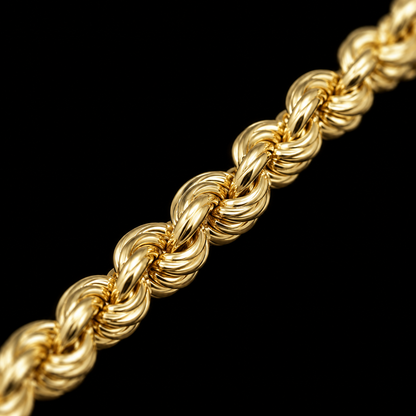Detalle macro del tejido torsal del pulso de oro de 6 mm, DP&C Joyas
