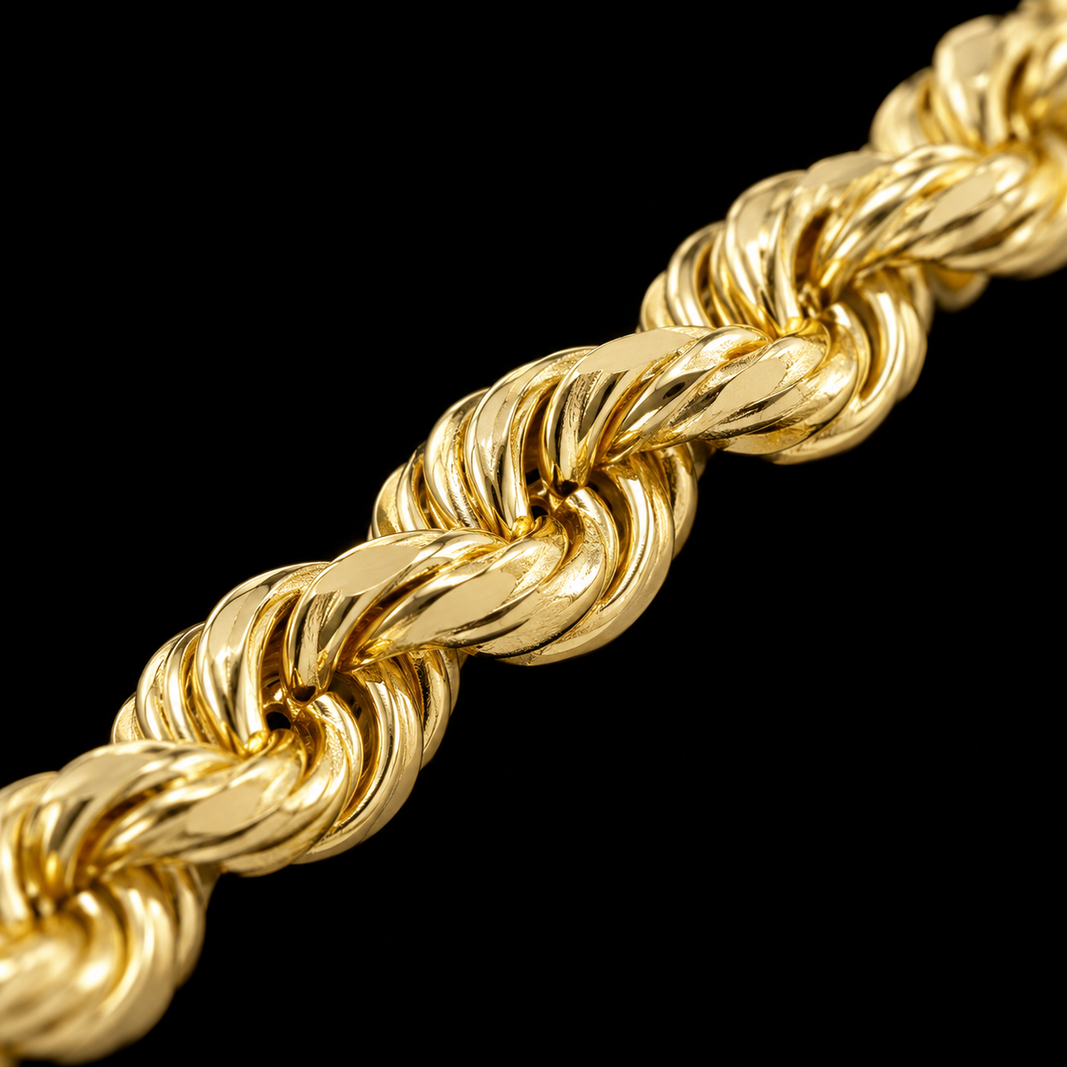Detalle macro del tejido torsal del pulso de oro de 8 mm, DP&C Joyas